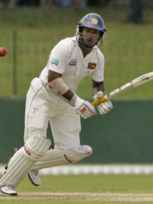 Sri Lankan captain Kumar Sangakkara looks on after playing a shot during the first day's play of...