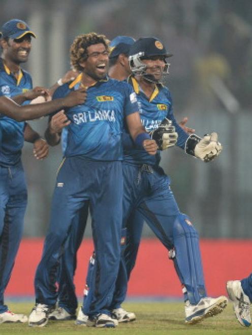 Sri Lankan players celebrate their victory over New Zealand. Photo Getty Images
