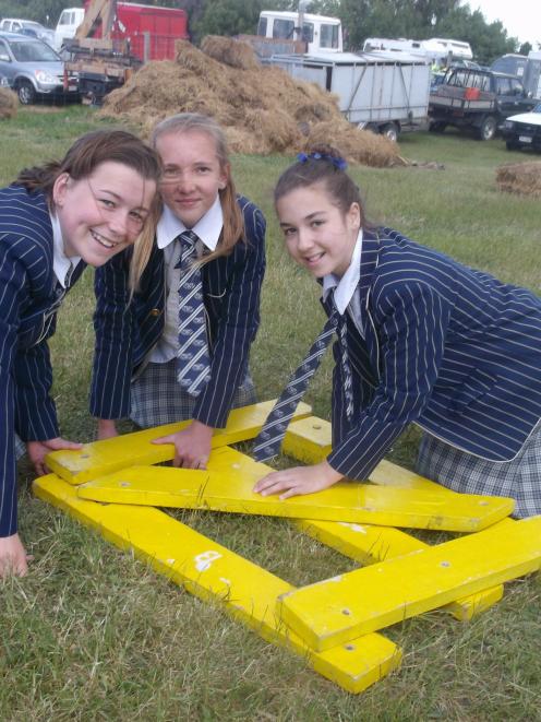 St Andrew's College pupils Meg Longley (left), of Christchurch, Izzy Pringle, of Ohoka, and Ella...