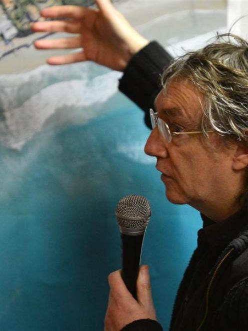 St Clair resident James Dignan makes a point at the public forum held in the Forbury Park Raceway...