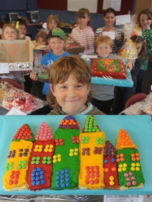 St Clair School pupil Quinn Shaw shows off the Italian cake he baked for the school fair today....