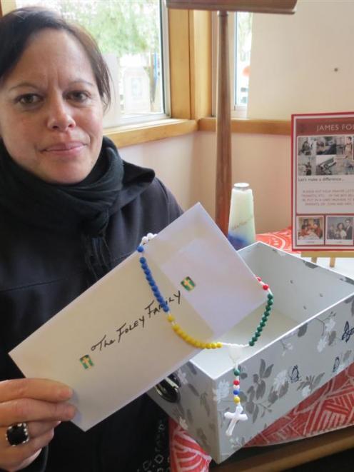 St Joseph's School teacher Moana Thorn with one of the letters to be sent to the family of slain...