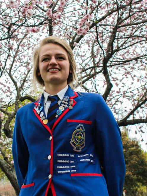 St Kevin's College head girl Isobel Ryan added another swimming blue to her blazer on Friday...