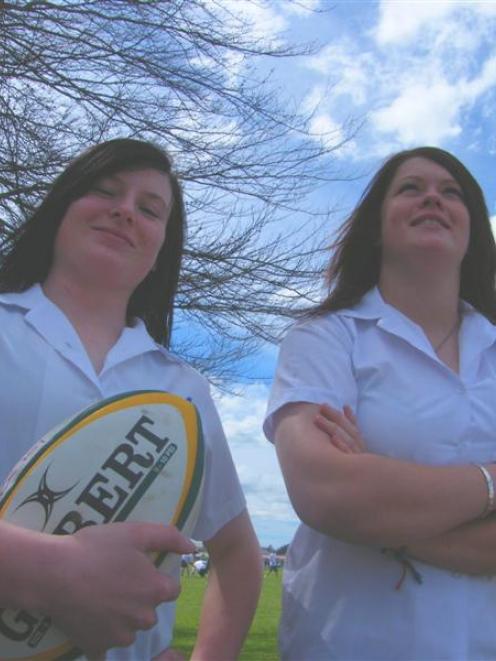 St Peter's College rugby players Melissa Fairbairn (left) and Sarah Williams (both 17) are...