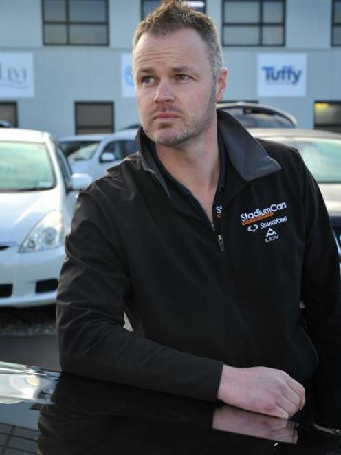 Stadium Cars Dunedin managing director Andrew Graham wants an end to a scam involving his...