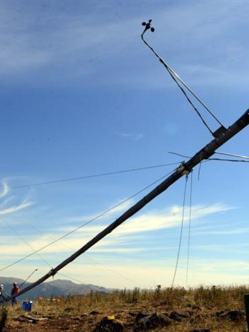 Staff from wind energy consultancy Energy 3 and Pioneer Generation install a 30m wind testing...