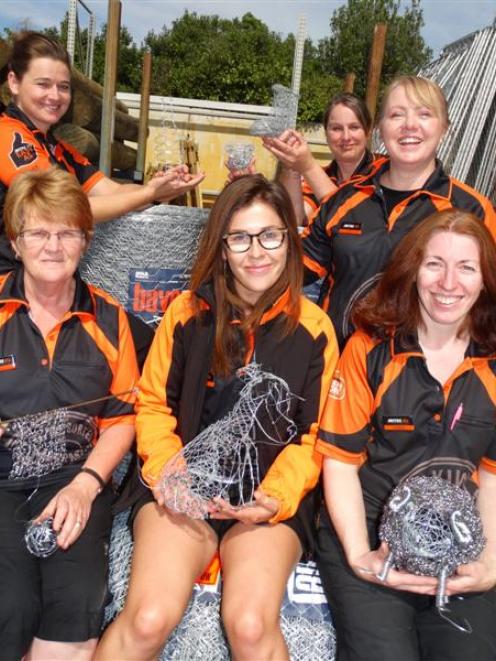 Staff members from Wanaka Mitre 10 (clockwise from front left) Roz Read, Hannah Twiss, Karen...
