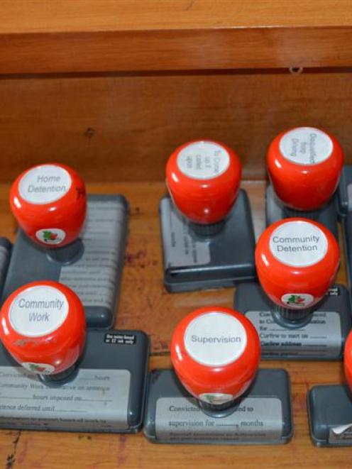 Stamps still sit on the judge's bench in the abandoned courtroom. Photo by Helena de Reus.