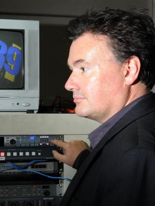 Station chief executive Daryl Clarkson in the control room yesterday with digital conversion...