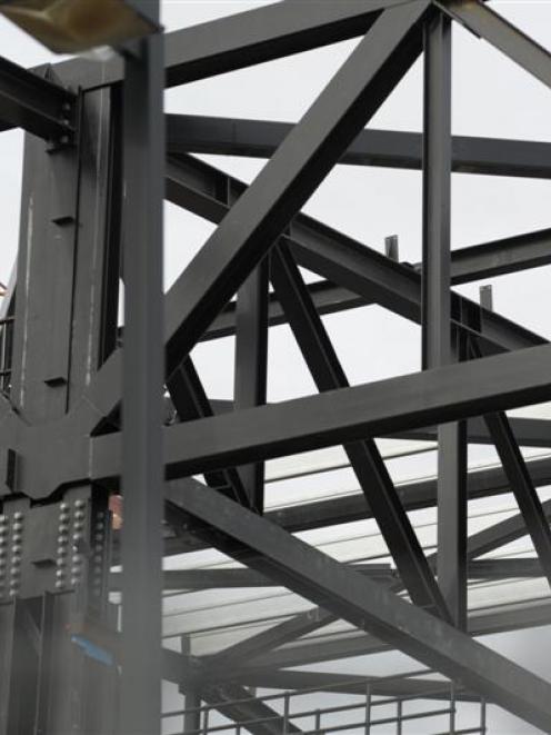 Steel trusses for the roofline of the main court of the rebuilt Stadium Southland, where the...