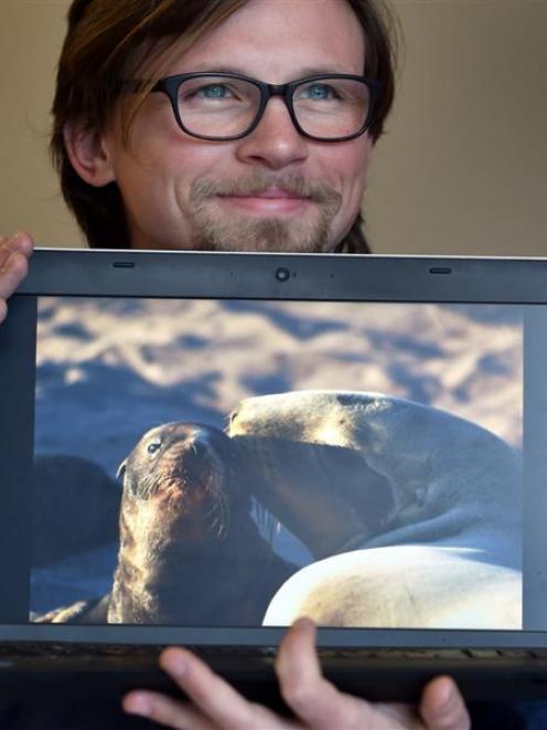 Stefan Meyer, a PhD candidate in the University of Otago zoology department,  displays an image...