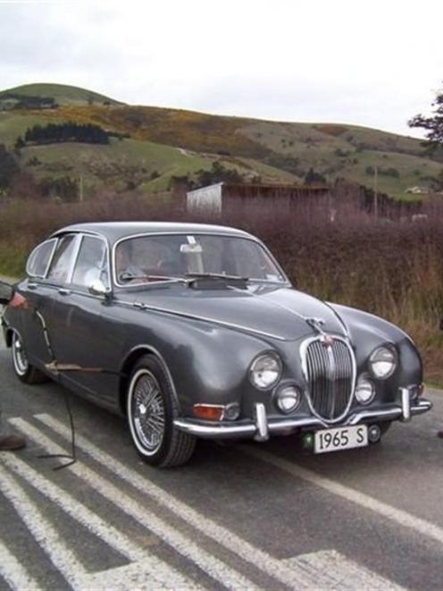 Steve McNulty's 1965 Jaguar is put to the test during the last quarter-mile sprint held along...