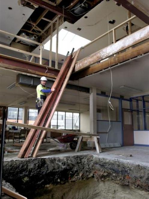 Steve Roberts, site foreman of construction company Lund, works above a recently dug lift-well...