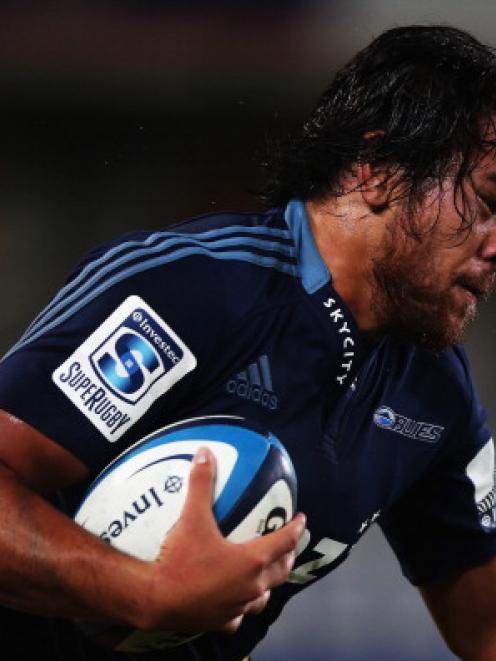 Steven Luatua of the Blues makes a break during the round nine Super Rugby match between the...
