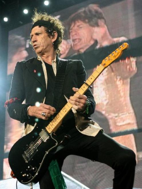 Keith Richards plays with the Rolling Stones at Western Springs, Auckland. Photo from NZ Herald.