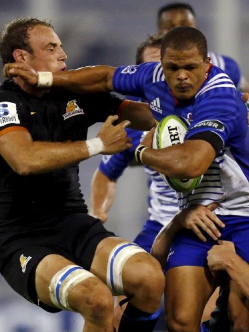 Stormers midfielder Juan de Jongh takes the ball into contact. Photo: Reuters