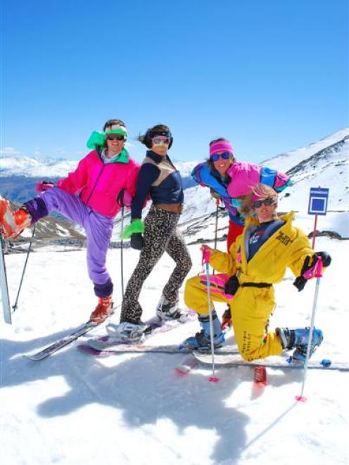 Striking a retro pose are from left Henry Baldwin, Nikki Cameron, Jim Windfield, and Kate Kuncove...