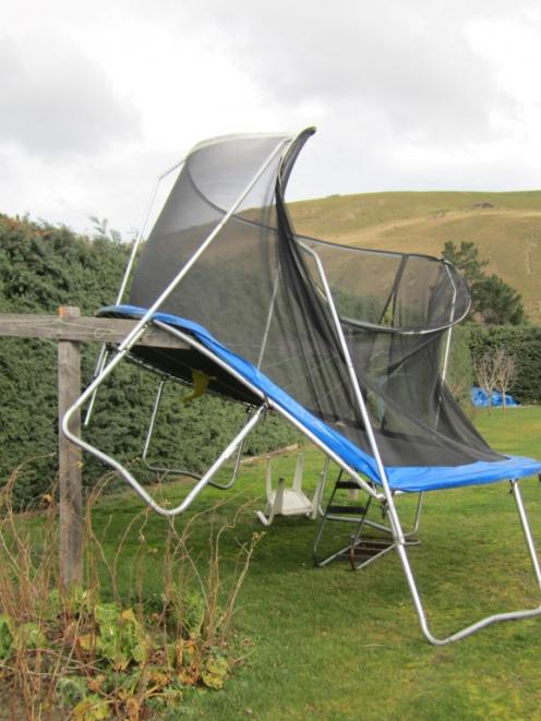Strong winds blew a trampoline on to a washing line in Miller's Flat. Supplied Photo