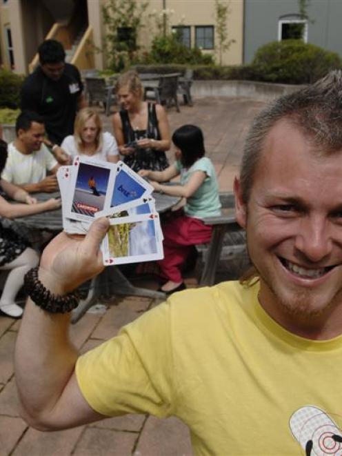 Student Scarfie Card scheme creator  Aaron Thompson  displays some of the cards at City College,...