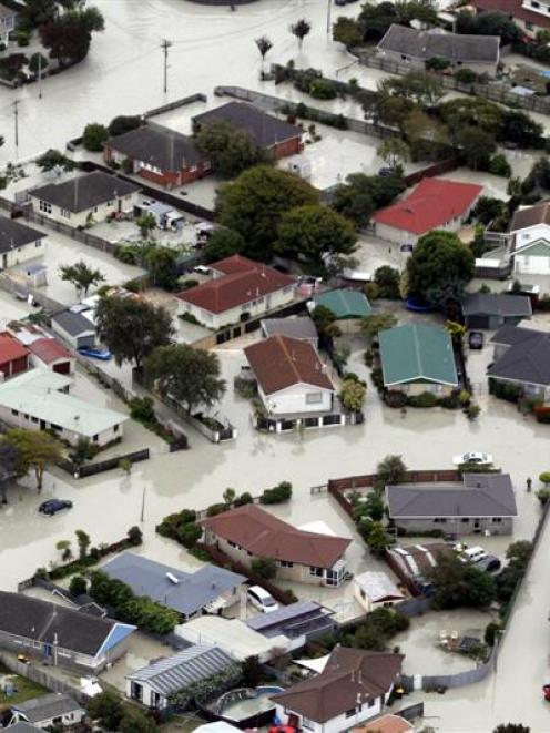 Suburbs such as Bexley (above) are unlikely to be rebuilt. Photo by <i>The New Zealand Herald</i>.