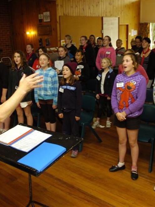 Sue Walker conducts Scouts and Guides through a rehearsal for the 2011 Gang Show to be held at...