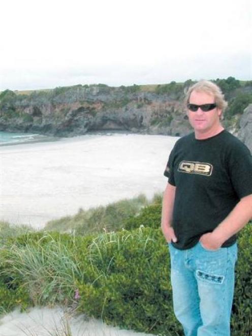 Surfer Graham Carse has been waiting since 1991 to have the sewage problem at Tomahawk Beach...