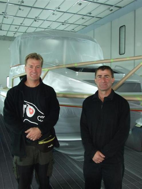 Swedish fishing guide Tommy Nerstrand (left) and Milton boat builder Steve McLay with Mr...
