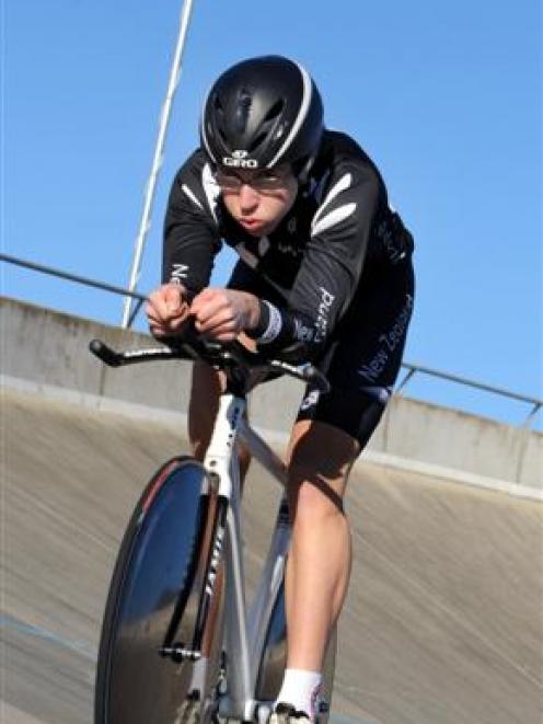 Taieri College cyclist Brad Evans hoofs his way around the Mosgiel Velodrome earlier this week....