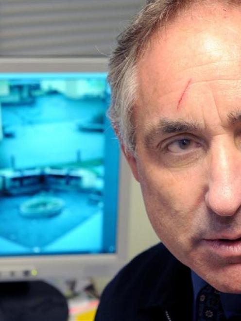 Taieri College services manager Mel Tudor monitors surveillance cameras installed on school...