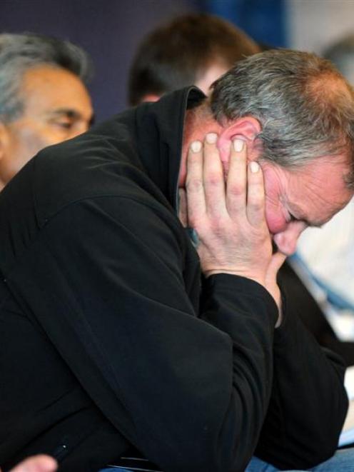 Taieri farmer Ad Bekkers contemplates the Taieri Rating Review in the public gallery during an...