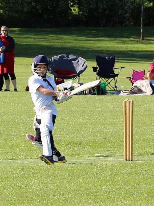 Taieri Sparkles player Jemma Wilson pulls a ball towards the boundary during a match at Memorial...