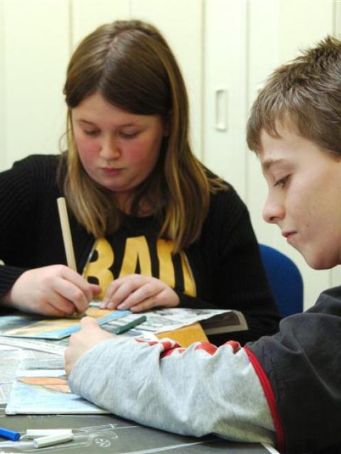 Taking part in a school holiday programme at the Mosgiel Public Library this week are11-year-olds...
