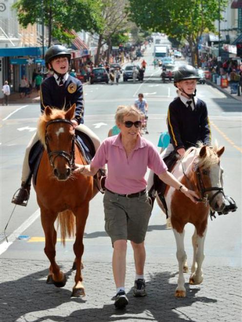 Taking part in the Ride The Rhythm street parade in Dunedin yesterday are (from left) Katelyn...