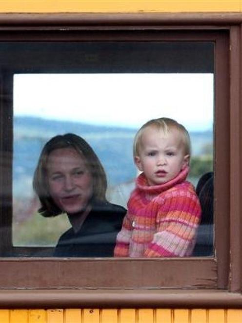 Taking two different approaches to their Taieri Gorge Railway suburban train trip from Mosgiel to...