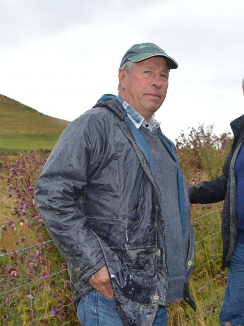 Tapanui farmer George Redditt and West Otago district councillor Jeff McKenzie  identify nodding...