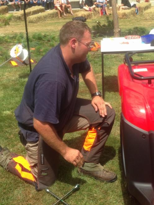 Tasman region winner Reuben Carter, of Christchurch City YFC, works on a quad bike.