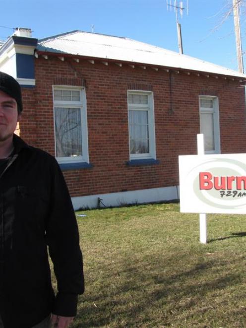 tation manager Quentin McIntosh in front of the  home of Burn 729am, the old Fenton Library in...