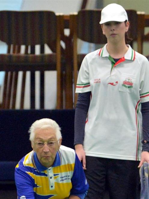 Tayla Bruce looks on as Bev Budd delivers her bowl during the New Zealand club championship...
