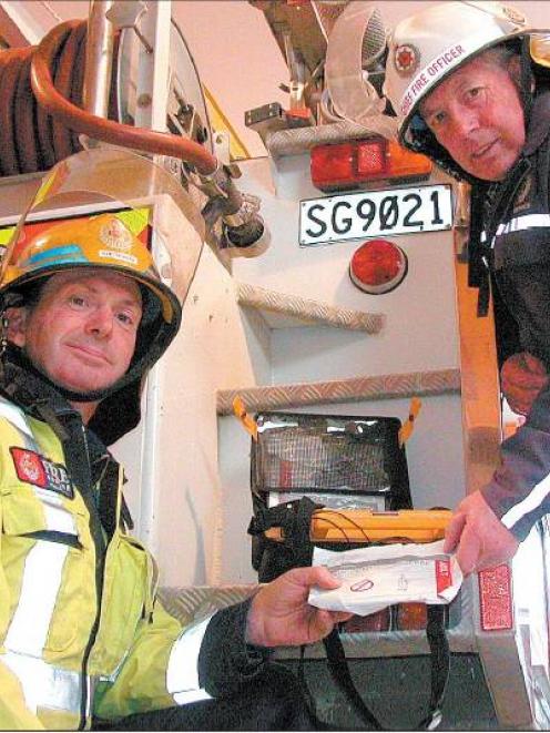 Life saver: Glenavy Volunteer Fire Brigade Senior Station Officer Bevin Joyce (left) and Chief...