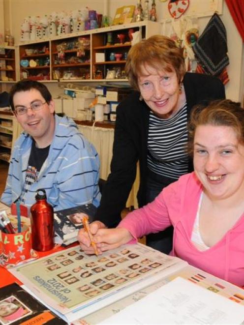 Teacher Trudy Scott at the Community Learning Centre, in York Pl, helps Aaron Williams, of...
