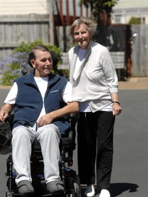 Ted and Heather Turner, formerly of Palmerston, at home in St Kilda are behind the Neurological...