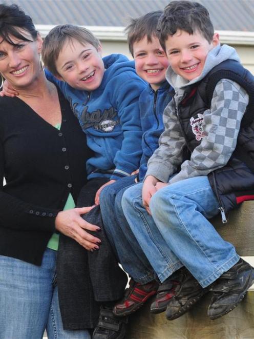 Television producer Charlotte Young, of Mosgiel, with sons (from left) Felix Coutts (7), Quinn...