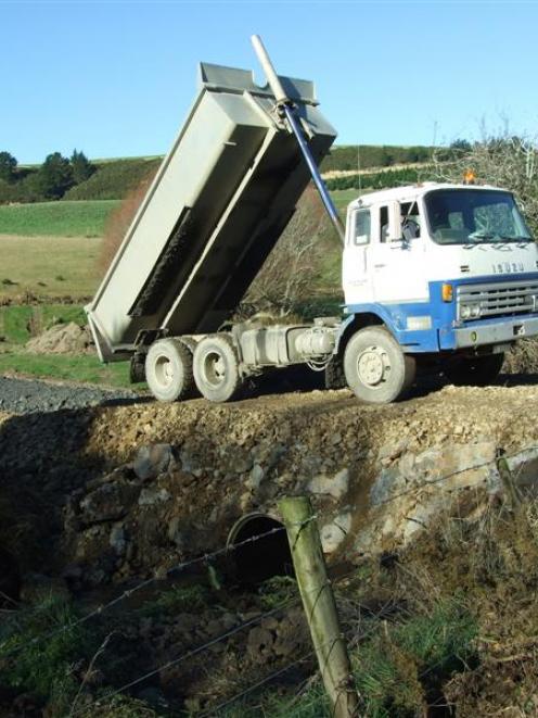 Temporary access to Bull Creek while the main access road is repaired will be over farmland via...