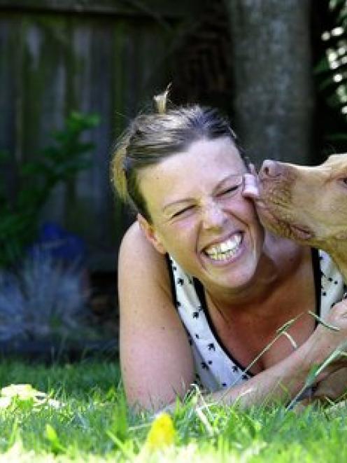 Terri Mann with her and her partner's adopted 9-month-old pitbull terrier cross renamed...