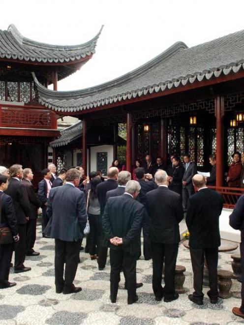 The 16-member Shanghai delegation and invited guests listen to speeches at yesterday's memorandum...