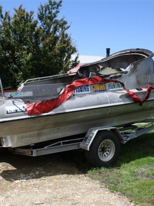 The 6-metre Kiwi-Kraft aluminium boat damaged by fire at Hampden on Tuesday. Photo by NZ Police.