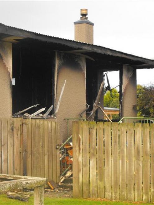 The accommodation unit at the back of the Catlins Inn was damaged by fire on Tuesday night. Photo...