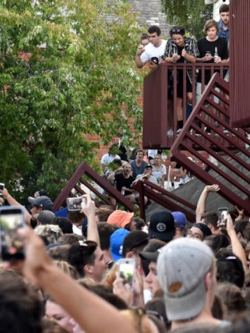 The balcony collapses at the Six60 concert at a Castle St flat on Friday night. Photo: Gregor...
