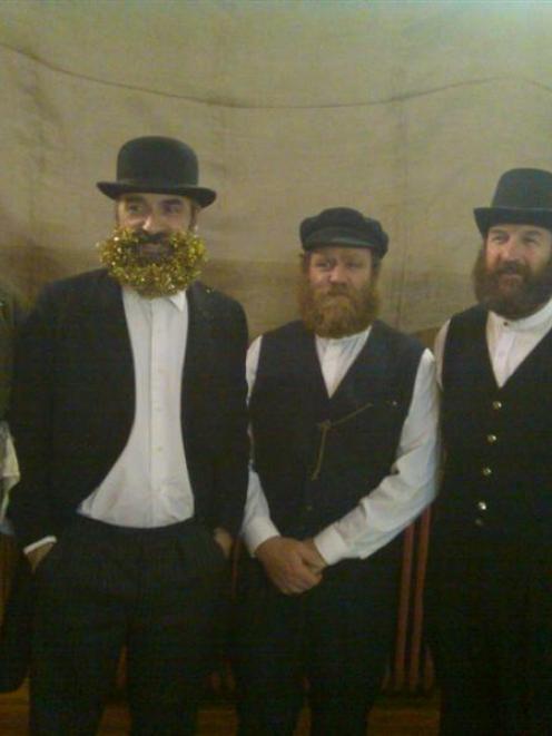 The bearded men before judging at the heritage fashion parade in Cromwell on Saturday night as...