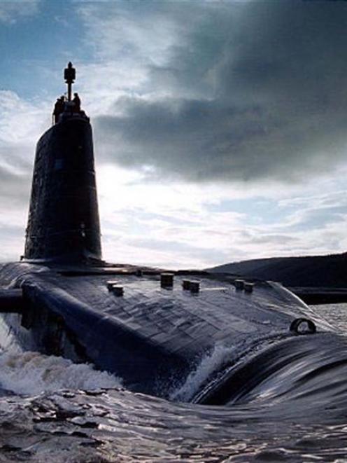 The British Navy's HMS <i>Victorious</i>, a Trident ballistic missile submarine, in the Clyde...